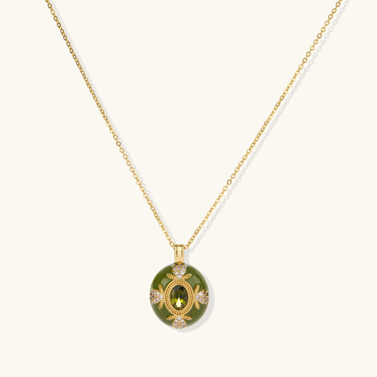 Emerald Empress Pendant with green enamel, olive-green zirconia and clear zirconia accents on a gold-tone chain.