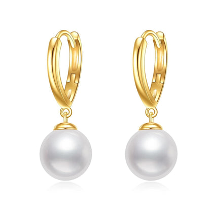 Solid 14K gold drop hoop earrings with freshwater cultured pearls on a white background.